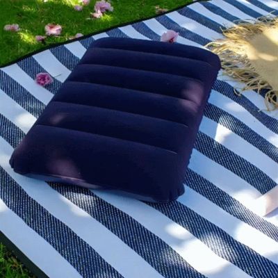 Coussin gonflable repose jardin sur carpette