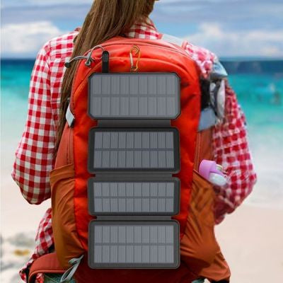 Femme batterie externe induction fixée sac marche plage