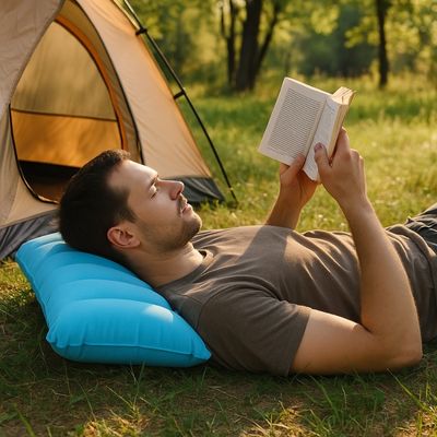 Homme lit camping tête coussin gonflable