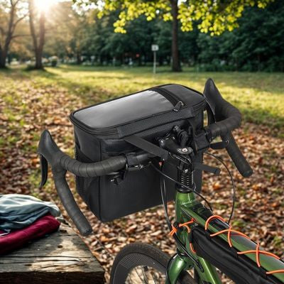 Sacoche guidon vélo fixée sur vélo côté table pique-nique